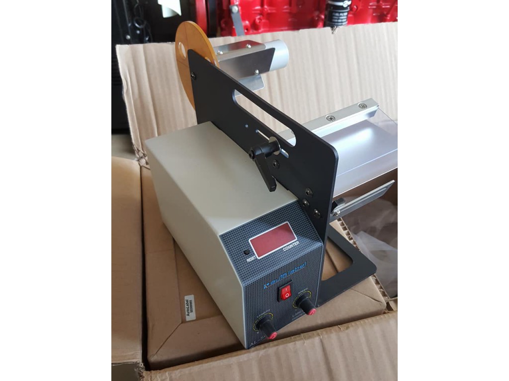 เครื่องลอก ติดสติ๊กเกอร์