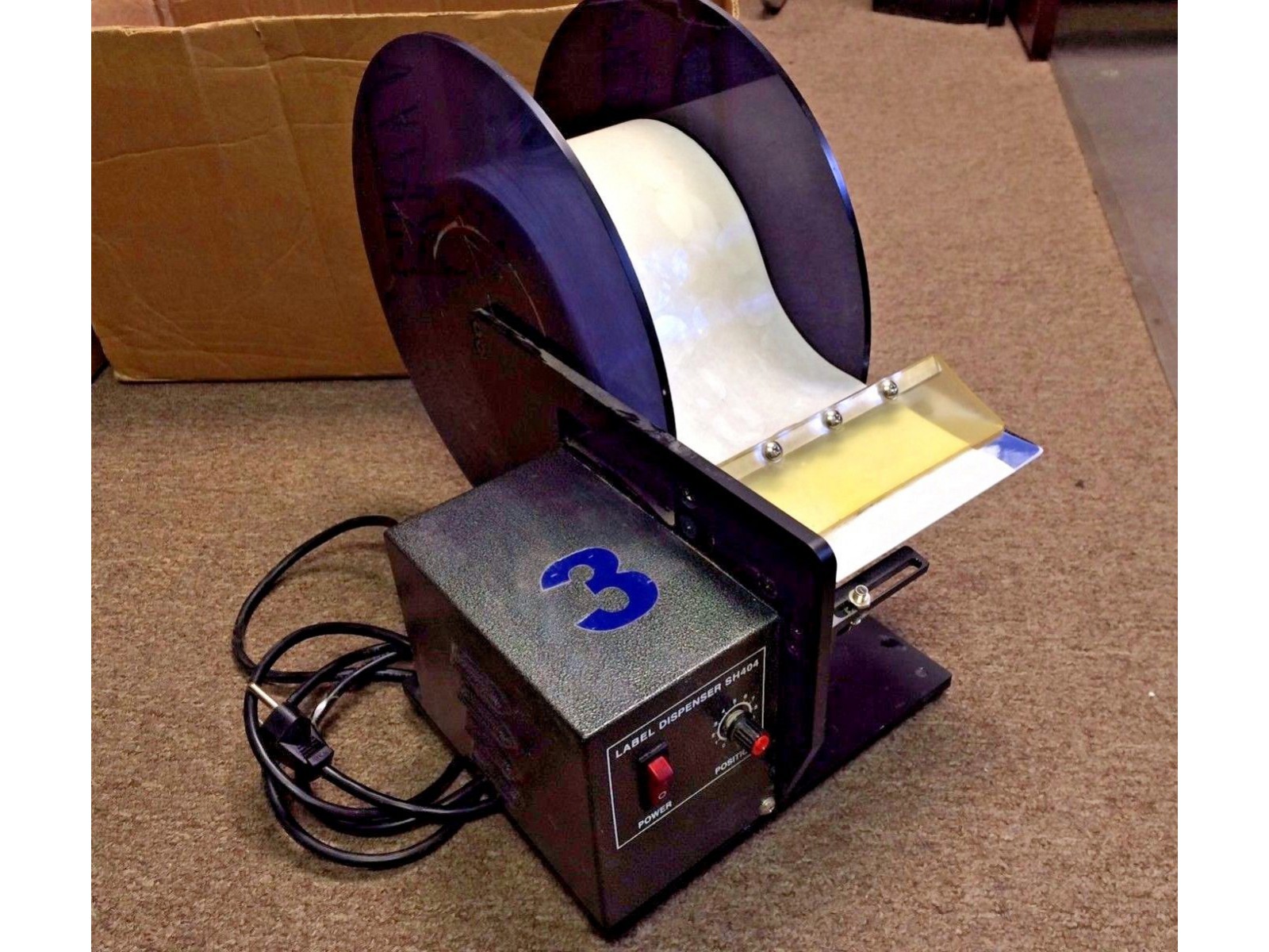 เครื่องลอกฉลาก SH404TR