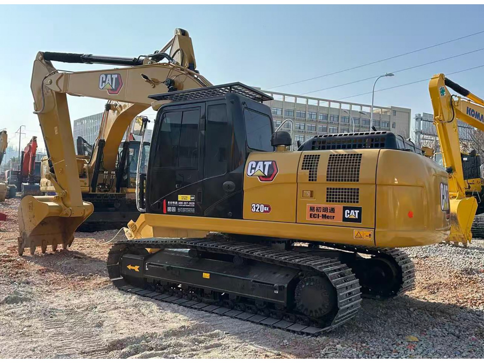 รถแม็คโคร CAT320GX